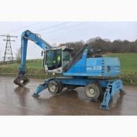 Грейферный перегружатель Fuchs MHL 335