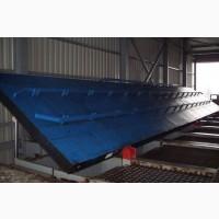 Гідравлічний боковий розвантажувач Водолей - ефективне розвантаження вантажів з комфортом