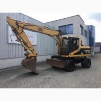 Колесный экскаватор Caterpillar M315