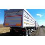 Автопоезд-зерновоз.Кузов V- 75 м3 на базе IVECO Trakker 6 х 4