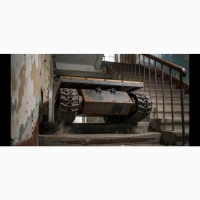 Трактор-вантажiвка з манiпулятором